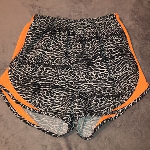 NIKE cheetah print athletic shorts